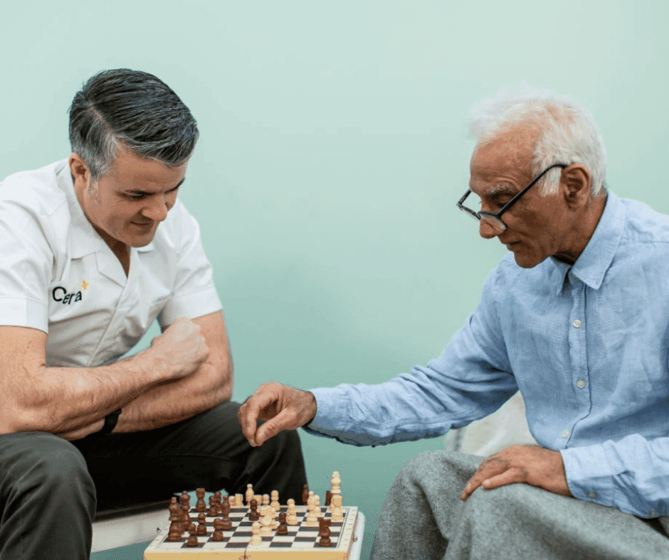 HHC Carer Playing Chess with Service User.png