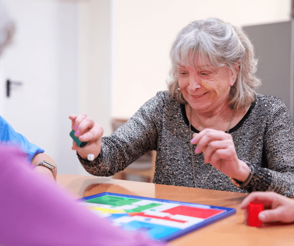 Elderly Person Playing Board Games.png